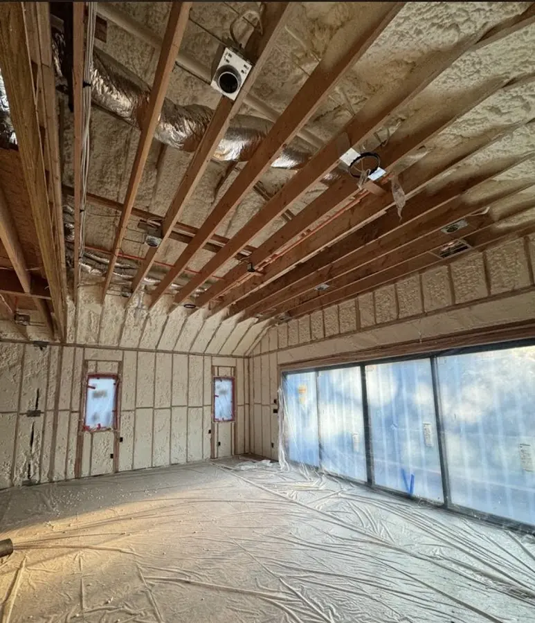 Interior walls and ceiling insulated with spray foam during new construction in Southfield